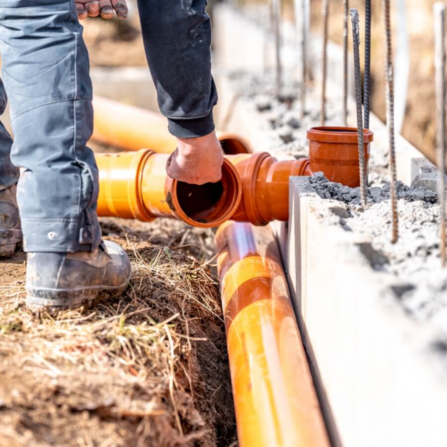 A sewage line being run